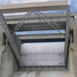 Image of a cement dam up close