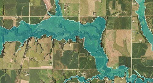 arial view of land with a blue area marked over the top