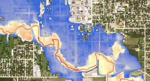 arial view of land with the flood risk area marked over the top