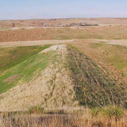 Image of a dam without any water