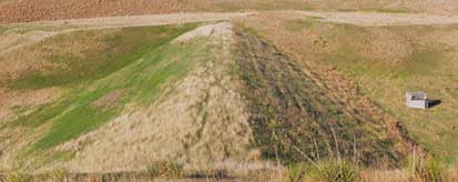 Image of a dam without any water